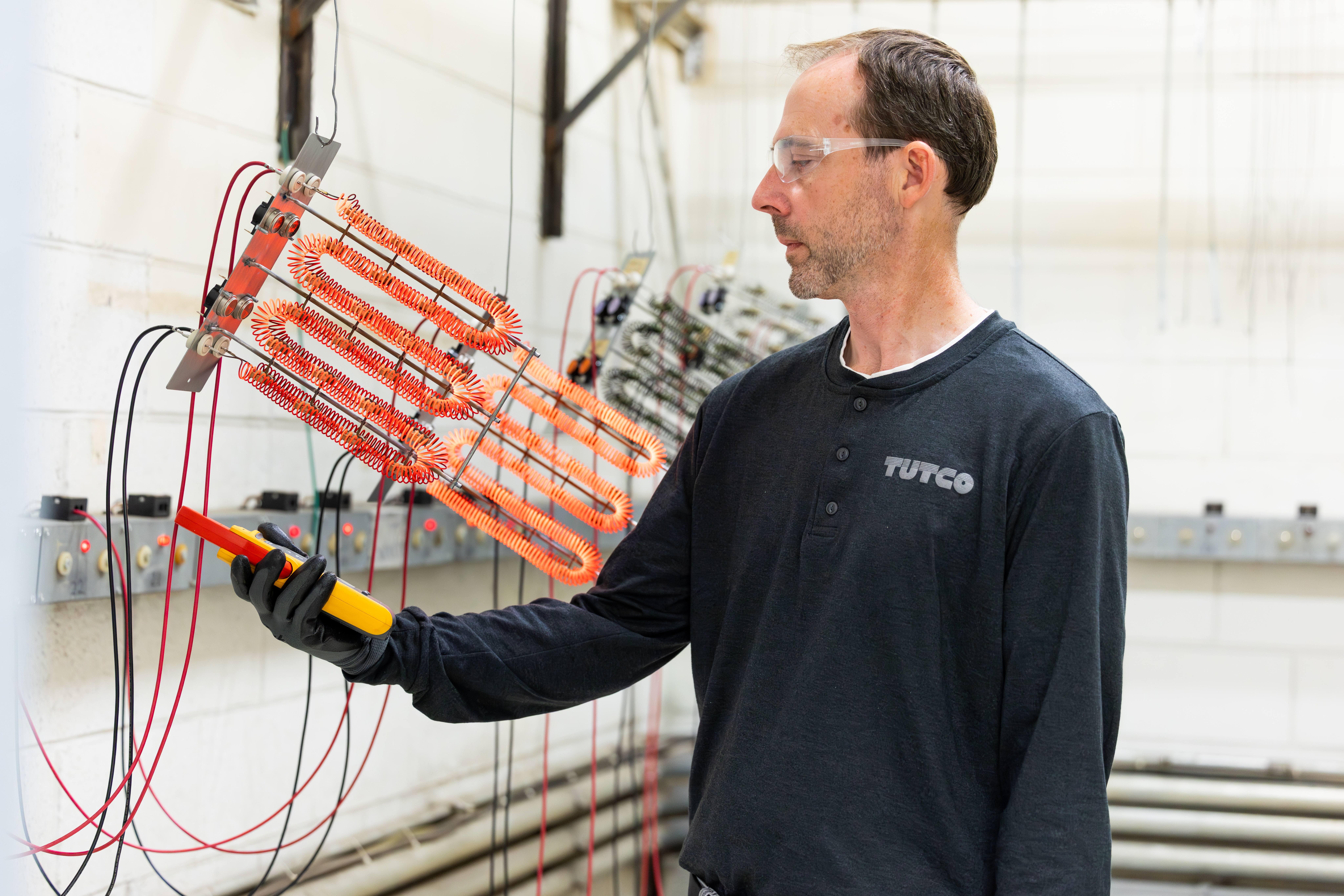 Man Wearing Tutco Uniform Working