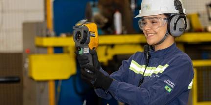 John Crane Employee Smiling While Working
