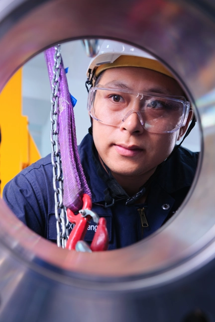 Lady Engineer In Uniform Working