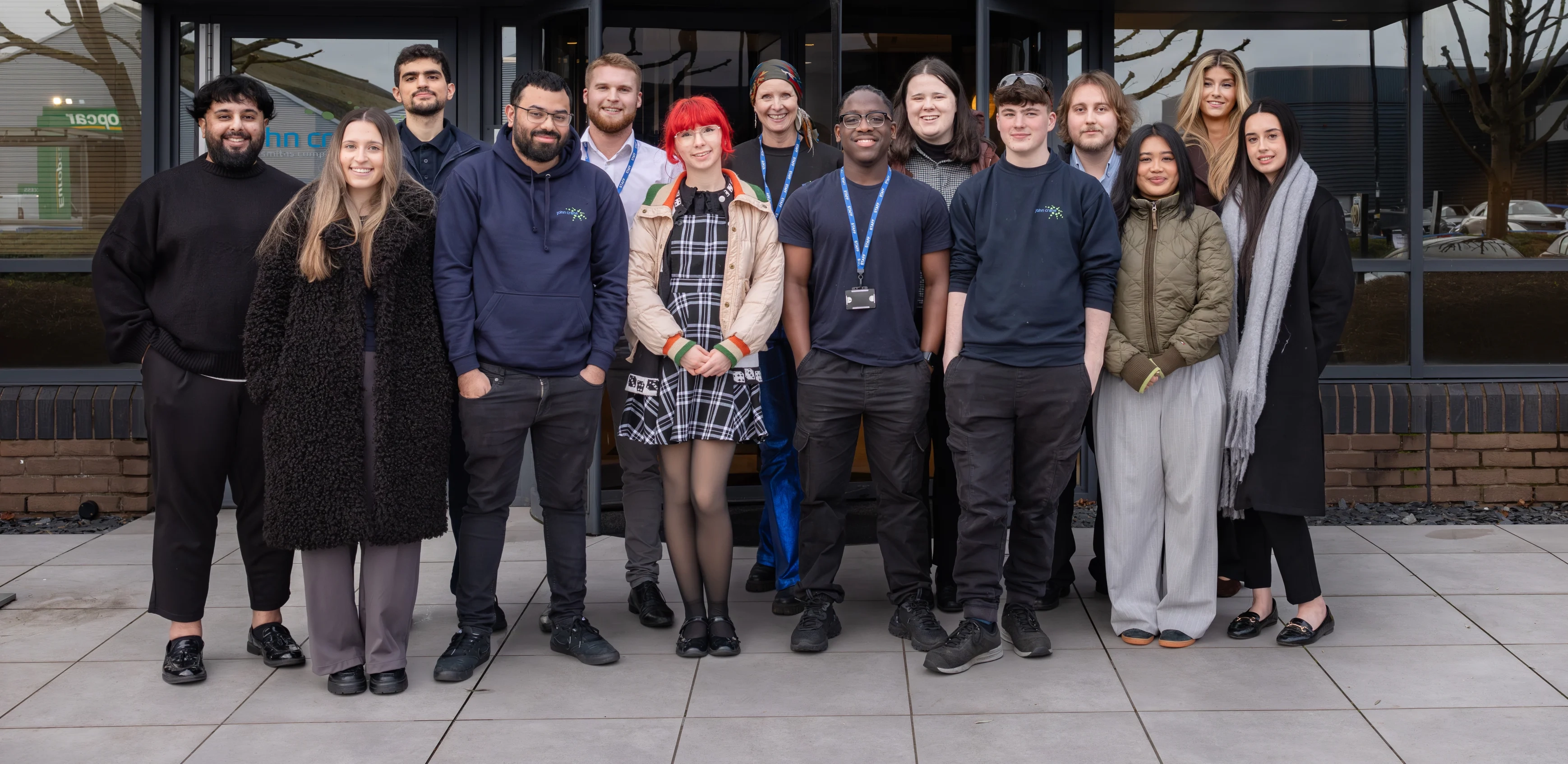 Sally Anne And Colleagues Standing In Front Of Building