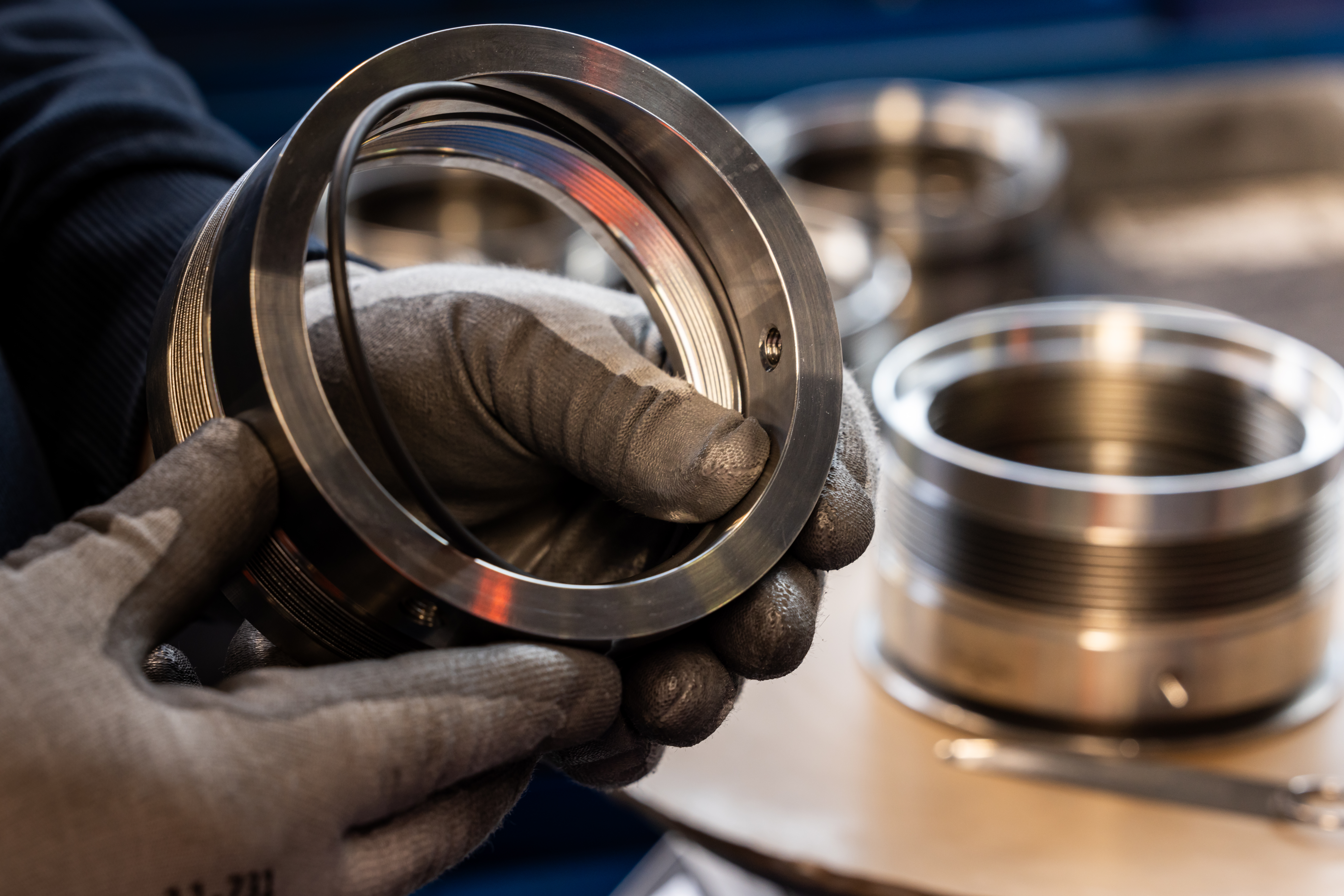 Close Up Of Worker Inspecting Product