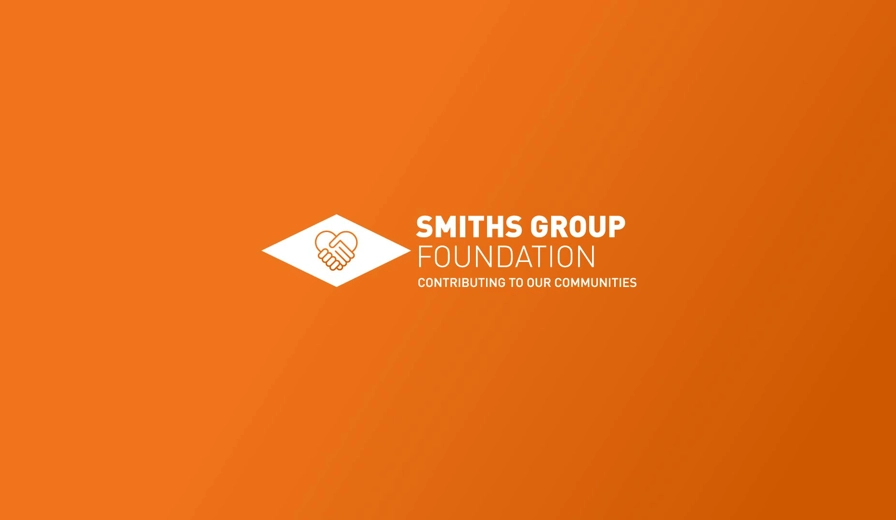 Smiths Group Foundation Logo On Orange Background