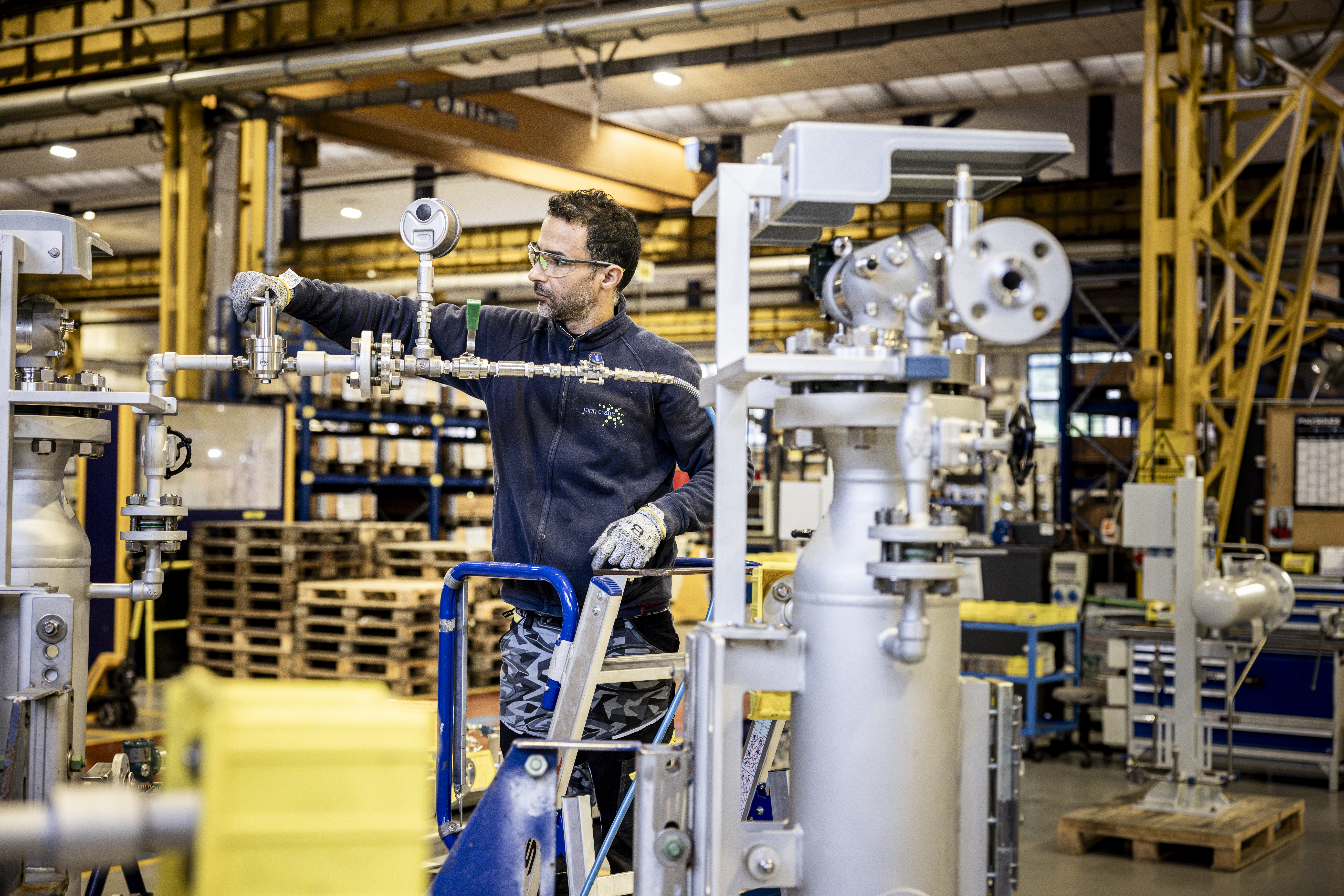 John Crane Colleague Adjusting Machine