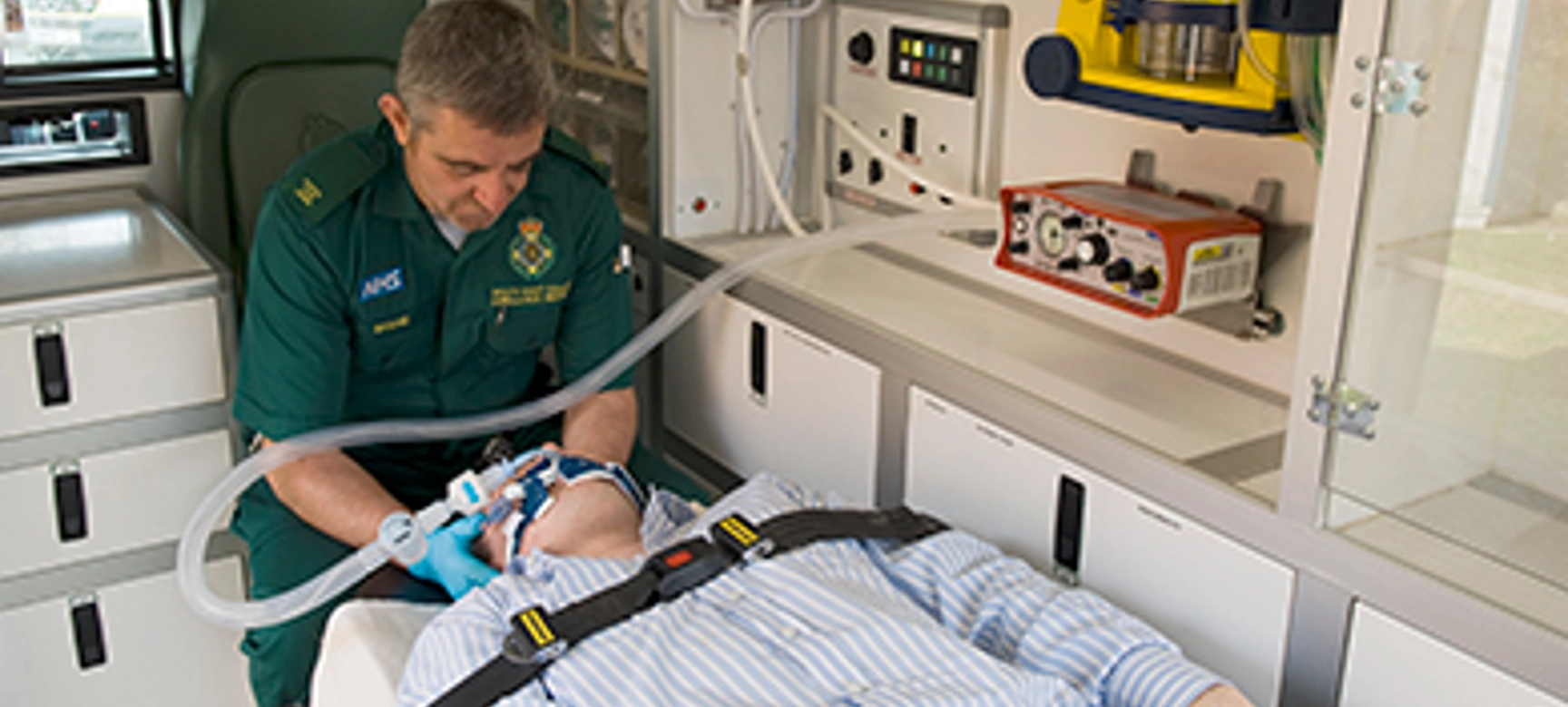Paramedic with patient and ventilator (1)